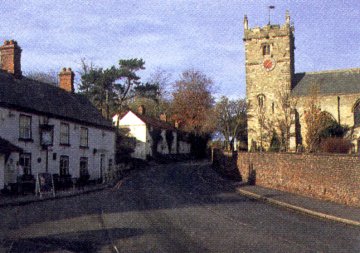 Hunmanby - The White Swan Inn & All Saints Church /photo by Arnold Underwood