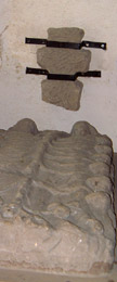 The carved gravestone & the section of Saxon cross in Lowthorpe church /from a photo by Arnold Underwood/Jan 2005